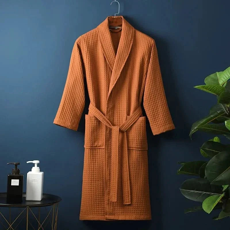 Person relaxing in comfortable unisex spa robe and sleepwear