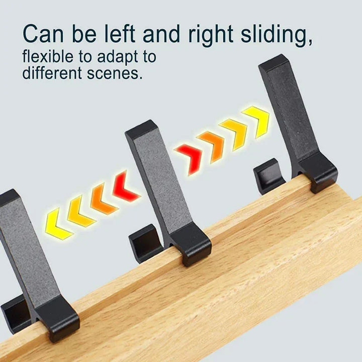 Close-up of sliding hooks on a modern wall coat rack for customizable hanging space