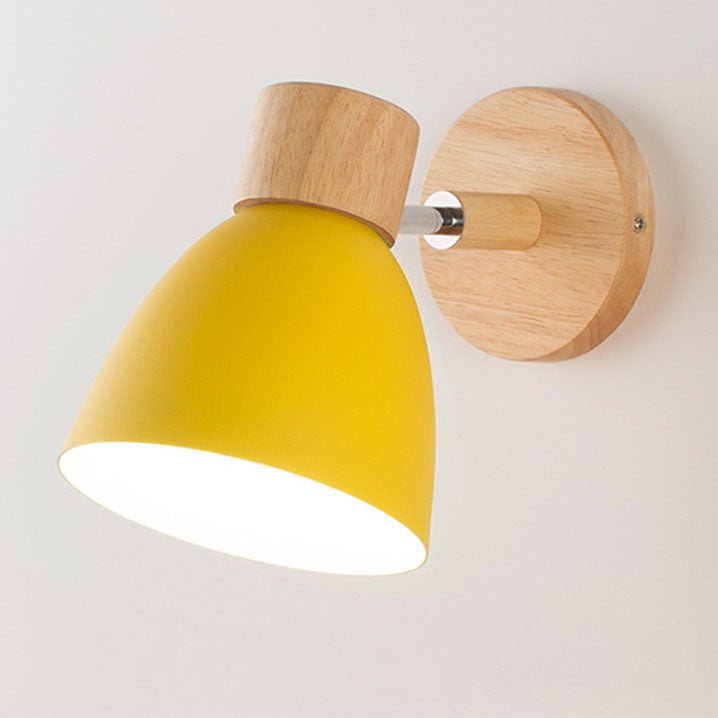 Yellow wooden cone wall lamp with minimalist metal frame and warm light