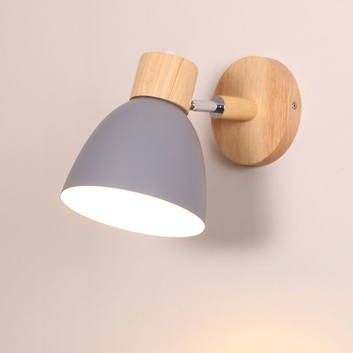 Sleek metal and wood wall lamp suitable for modern living room decor