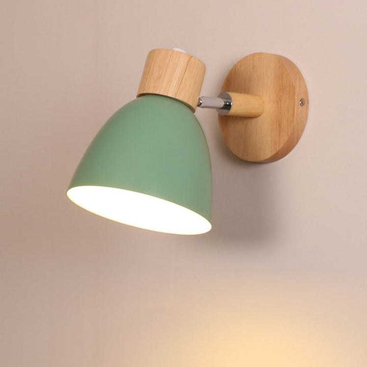 Designer wooden cone wall lamp glowing softly in hallway setting