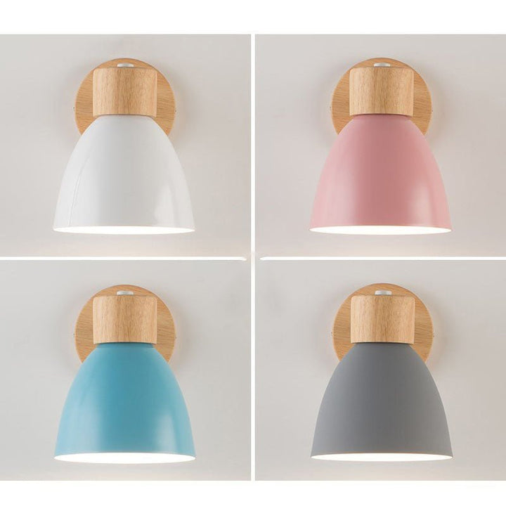 Bedside light with natural wood cone shade and adjustable metal arm
