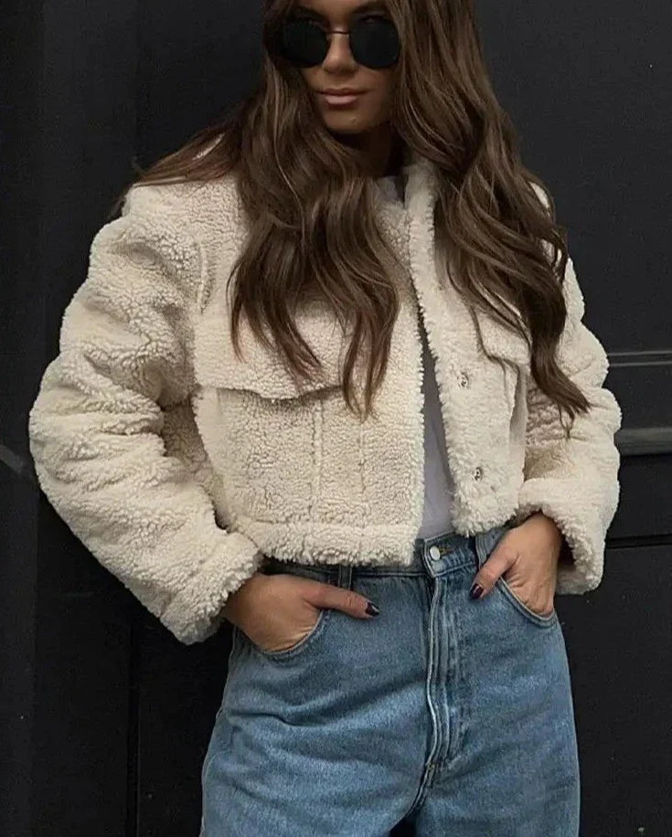 Close-up of the textured Beige Lucia short coat with zipper