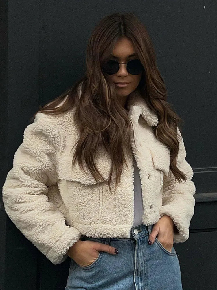 Side profile of the Lucia warm short winter coat in Beige