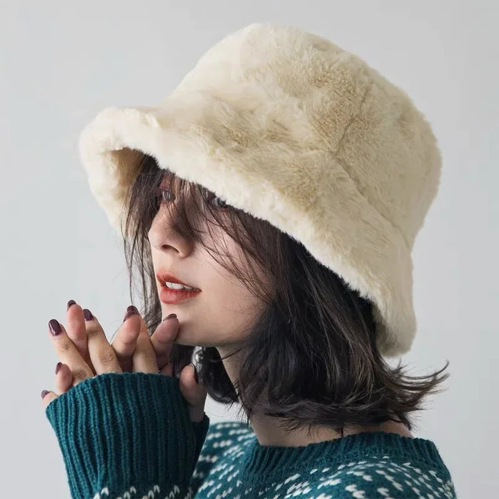Premium plush winter bucket hat for women, lifestyle flat lay