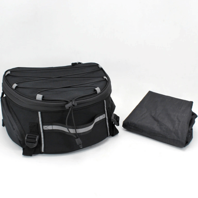 Unisex motorcycle touring gear bag opened to display main storage compartment