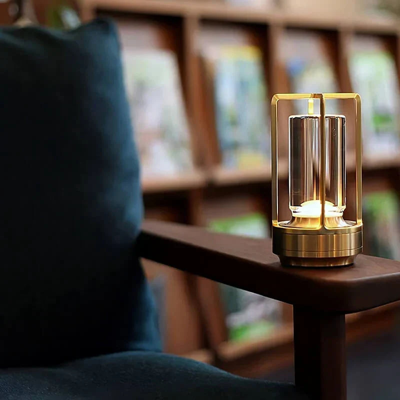 Crystal table lamp casting decorative light patterns on a wall