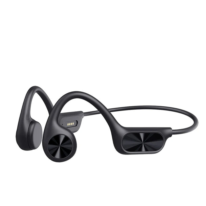 Side view of black open-ear swimming headphones showing charging contacts and ergonomic frame