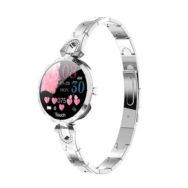 Silver women's smart fitness watch displaying digital time and health data