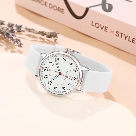 White nurses watch displayed aesthetically on a neutral surface