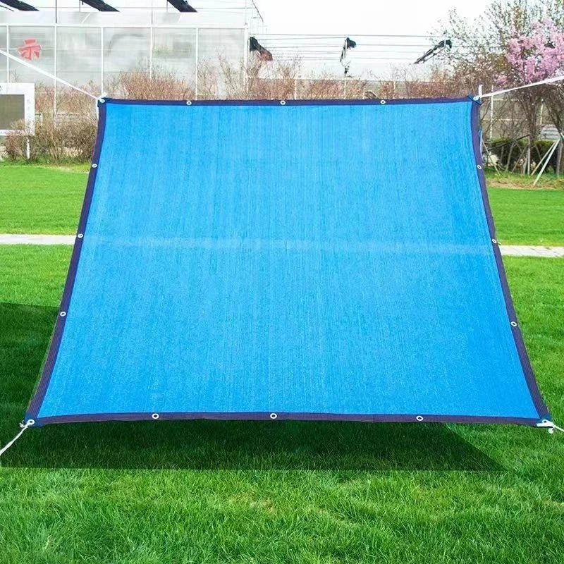 Weather-resistant outdoor cover blocking harsh sunlight on a terrace