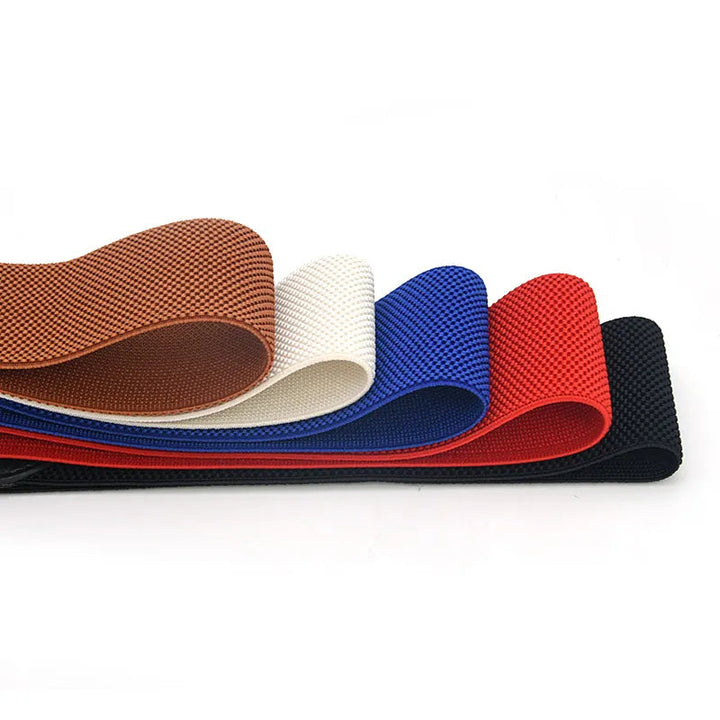 Stylized view of the women's elastic belt wrapped to show its durable construction and Parisian aesthetic.