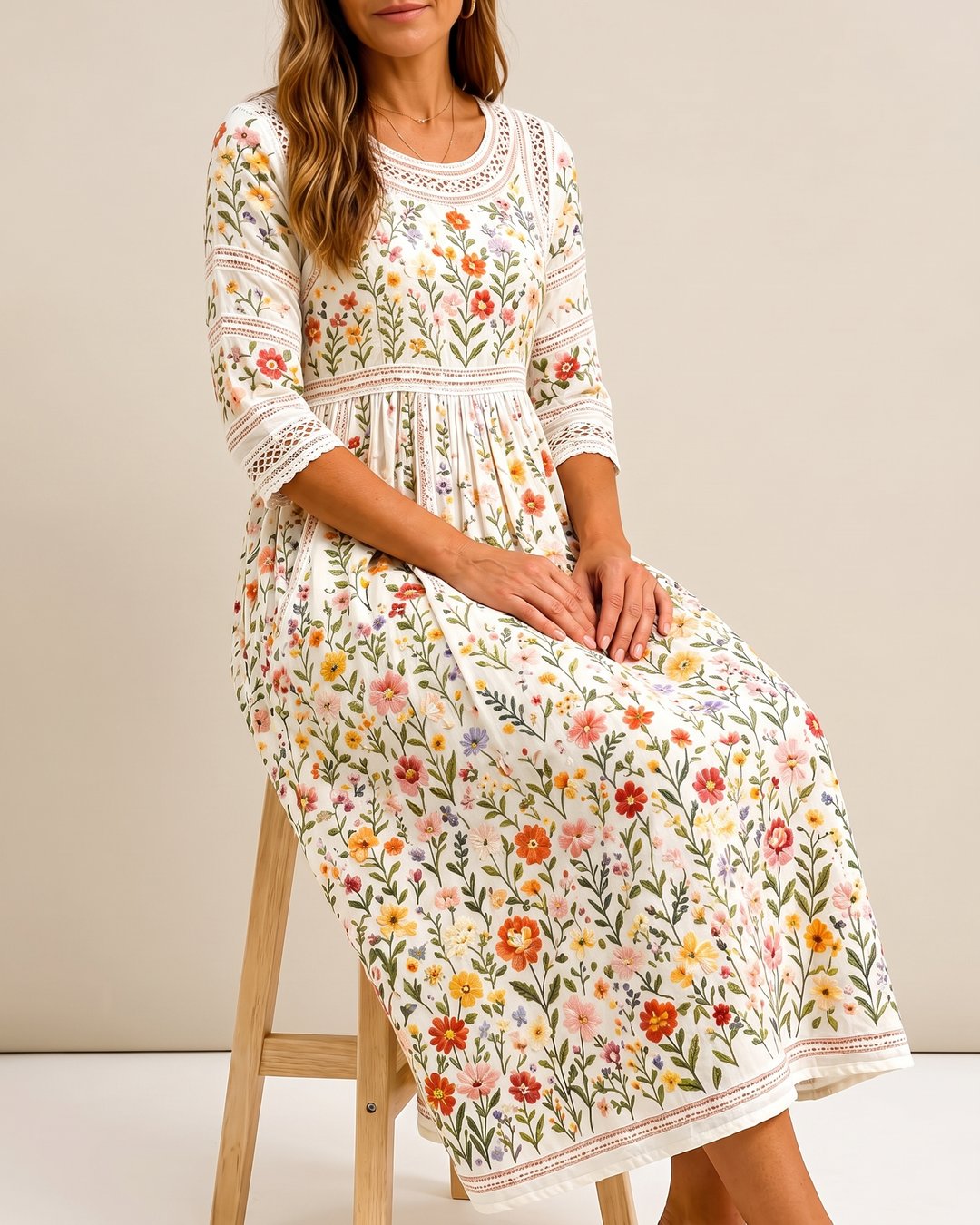 Elegant floral midi dress styled with a belt for a flattering women's silhouette.