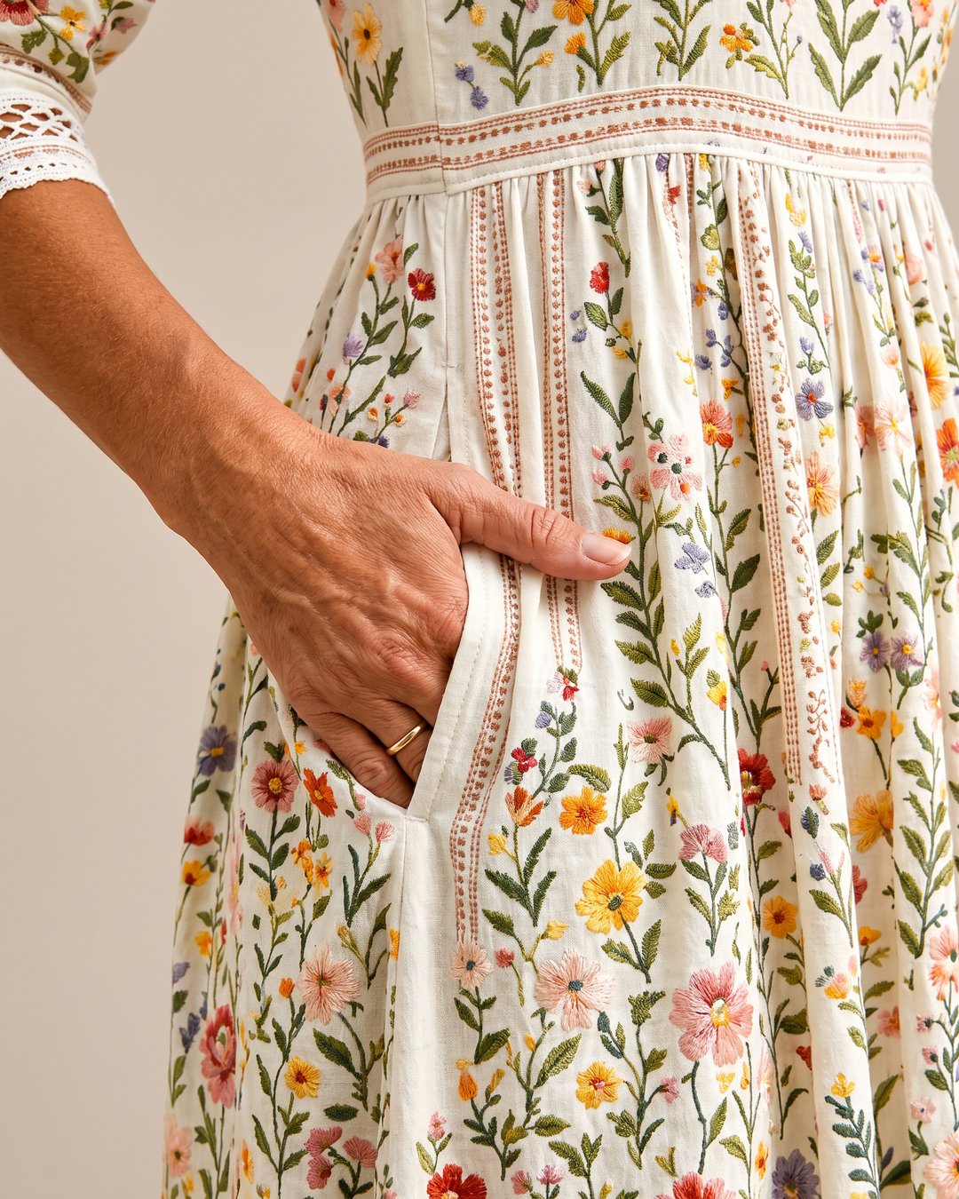 Women's floral midi dress in meadow print, showing back view with zipper closure.