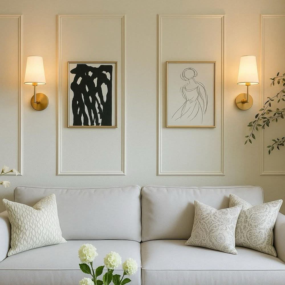 Gold wireless wall sconce with fabric shade mounted in a bright living room