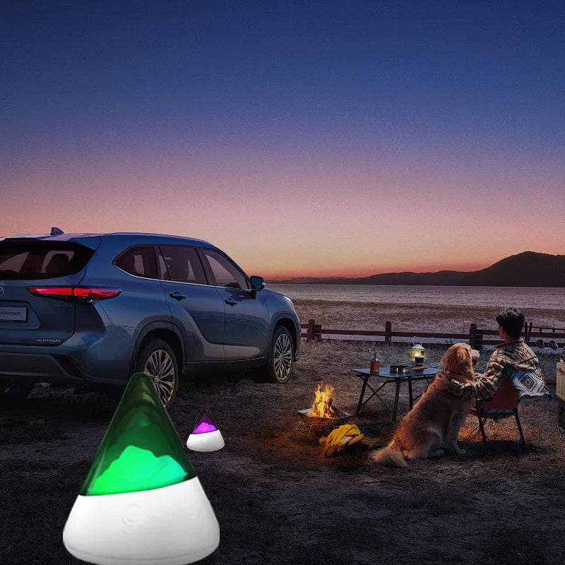 Wireless LED Iceberg Night Light showing vibrant RGB color changing ambient lighting on a wooden nightstand