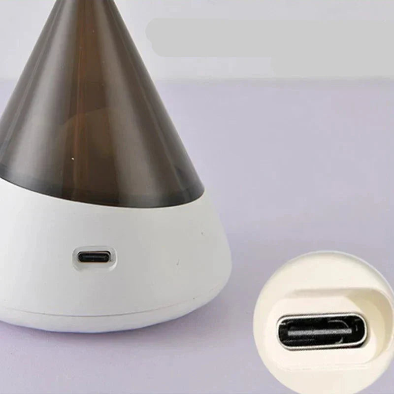 Ambient lighting iceberg shaped night light displayed on a stylish bookshelf as home decor accessory