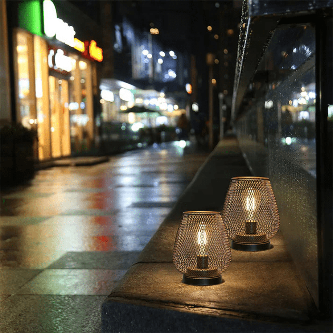 Minimalist battery operated table light featuring stylish metal lantern construction