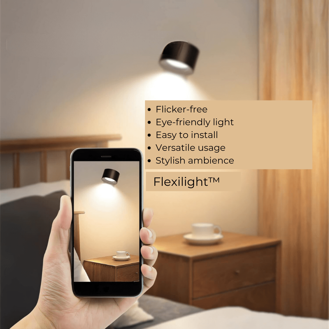 Cordless LED wall lamp demonstrating 360-degree rotation on wooden surface