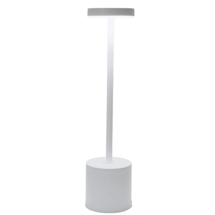 Wireless metal LED table lamp for indoor and outdoor use on dining table
