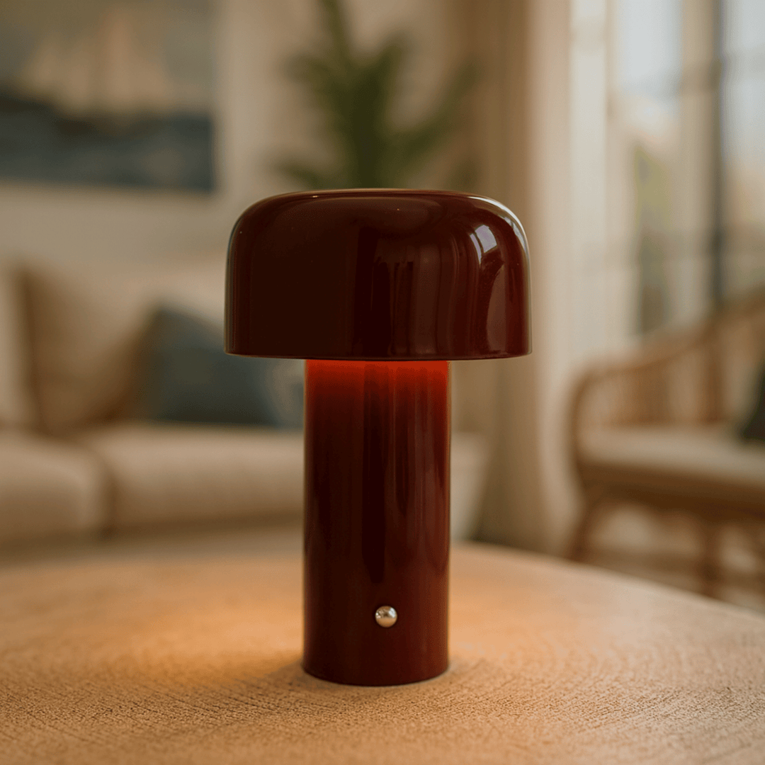 Close-up of the sleek metal finish and warm glow of a modern wireless lamp