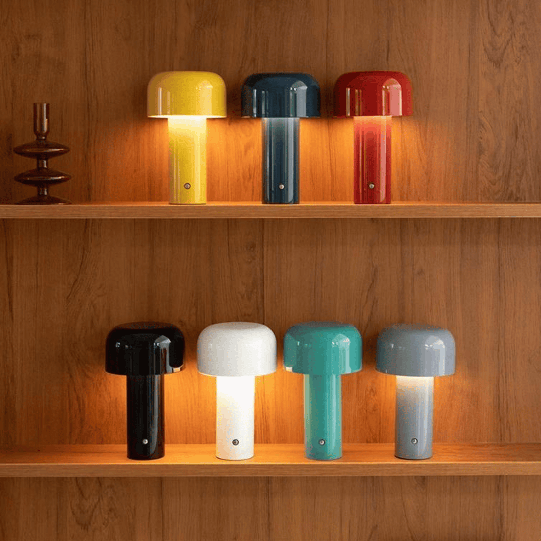 Cordless LED table lamp illuminating a stylish dining table setting at night