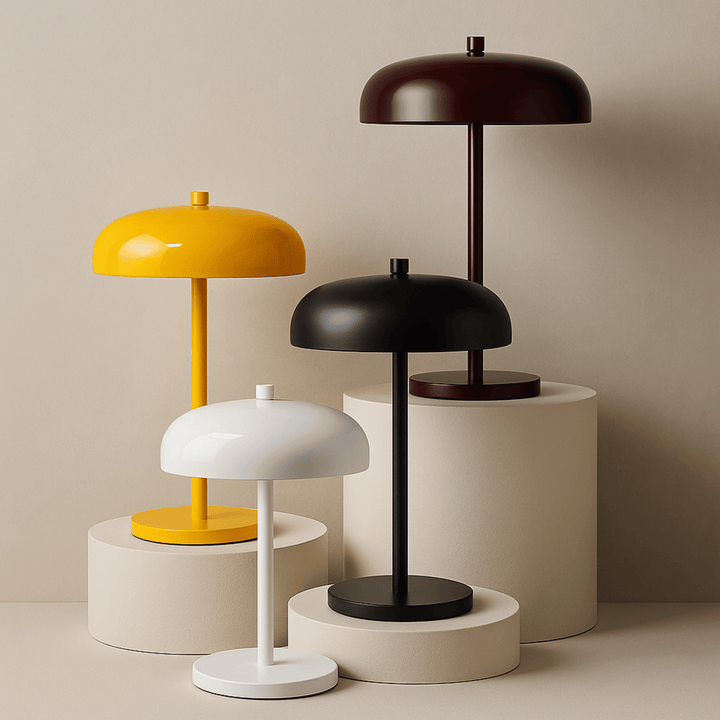 Collection of white, black, and yellow wireless table lamps