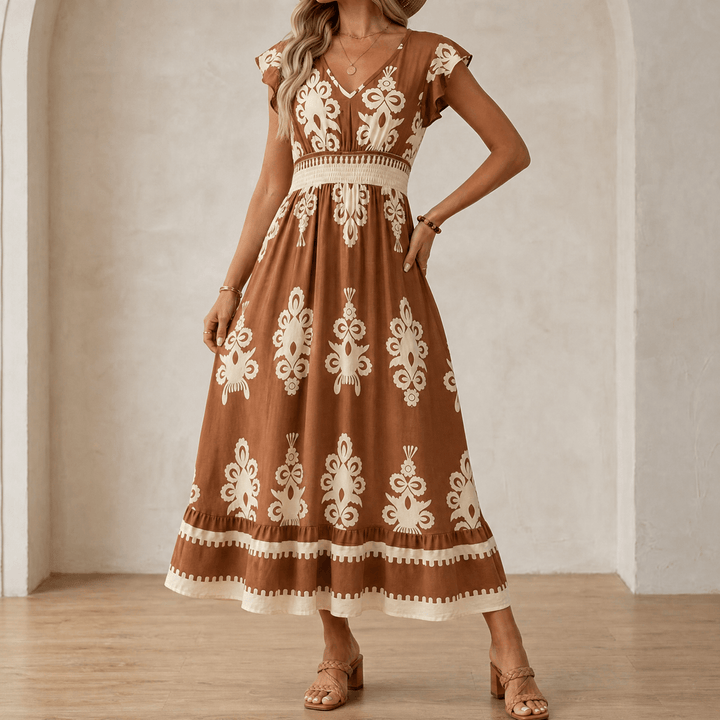 Women's baroque print maxi dress featuring short sleeves and elegant pattern