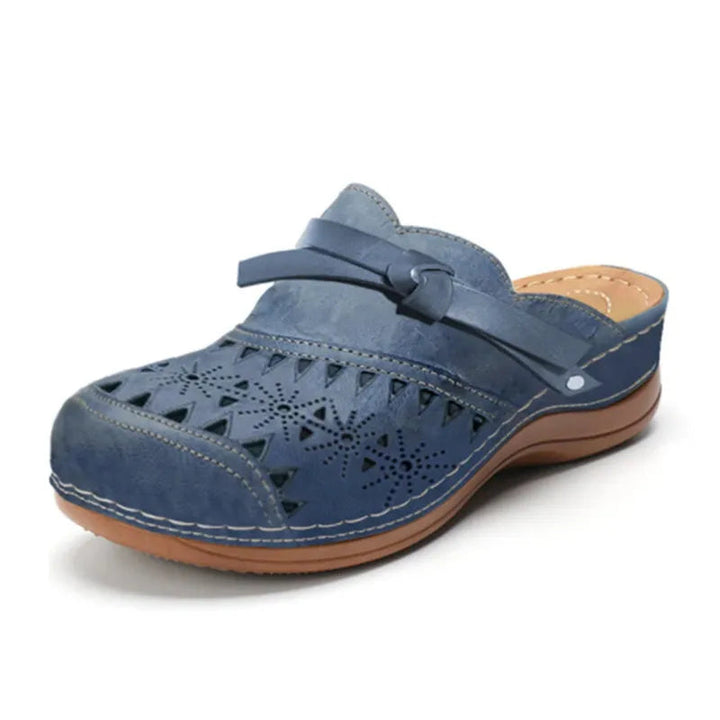 Blue women's bow accent cutout slip-on clog shoe