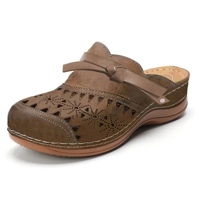 Top view of womens casual slip-on shoes featuring a decorative bow