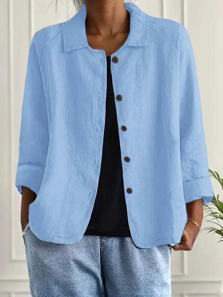 Woman wearing light blue button-through casual jacket