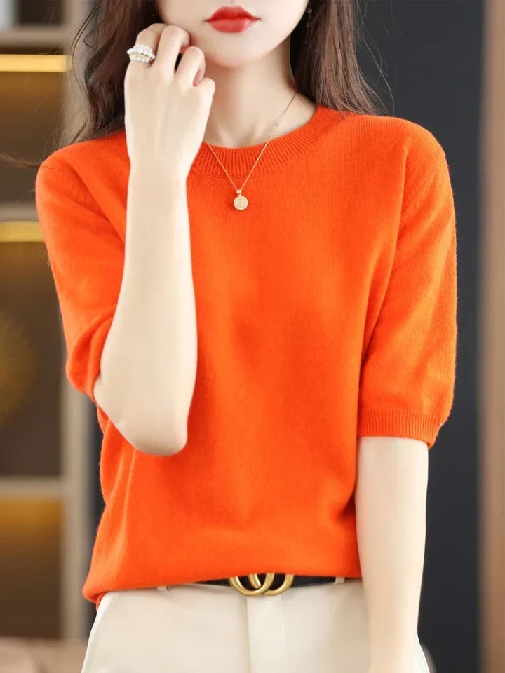 Womens fashion knitted pullover sweater featuring short sleeves and crew neck