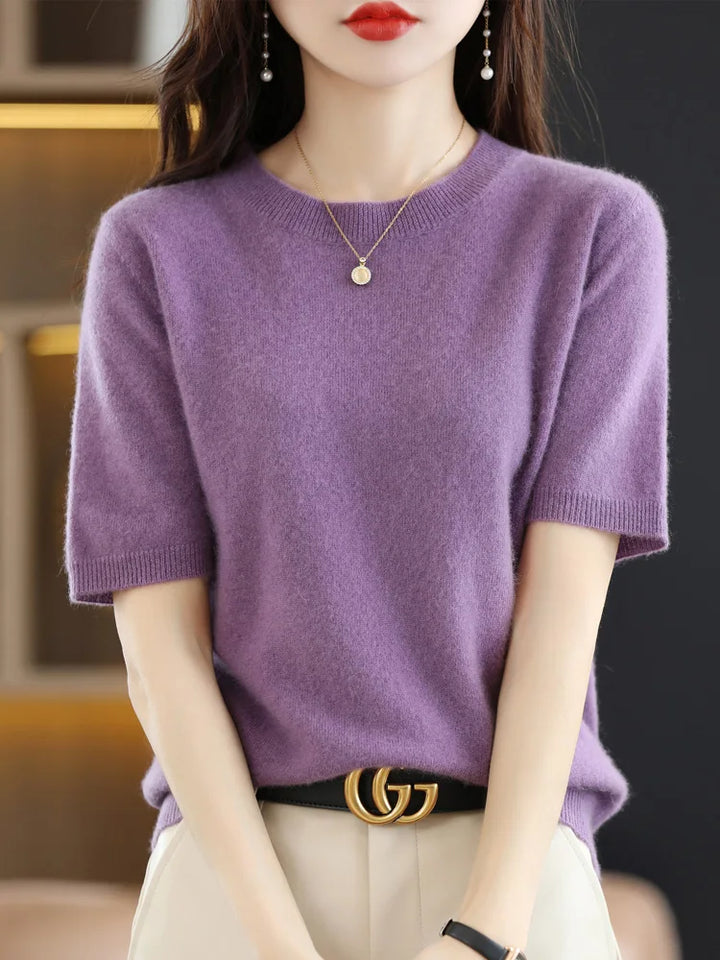 Side view of women's short sleeve crew neck knitted pullover sweater top