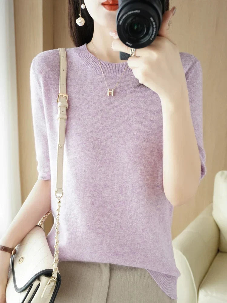 Back view of women's casual crew neck short sleeve knit sweater pullover