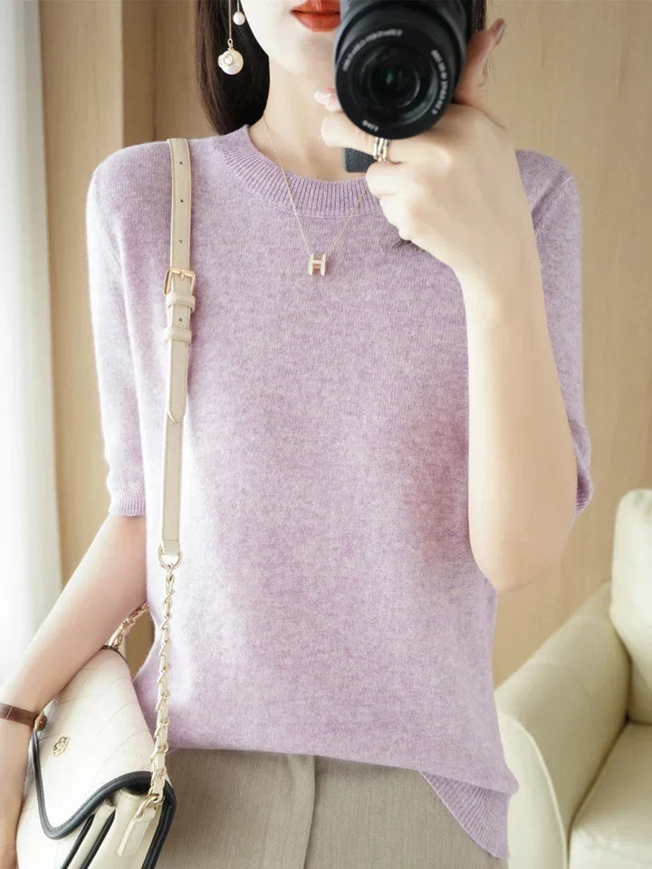 Back view of women's casual crew neck short sleeve knit sweater pullover
