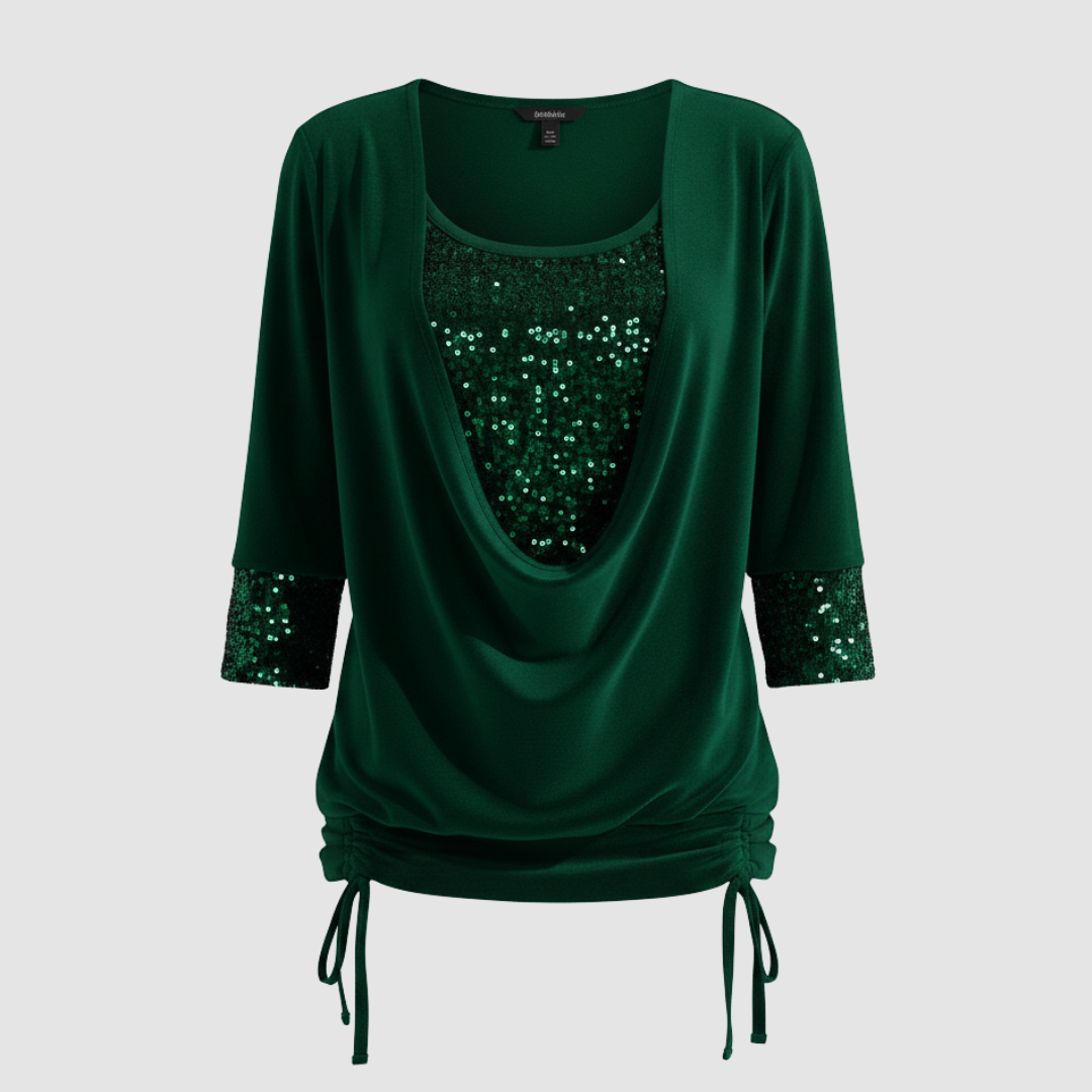Green sequin long-sleeve blouse displayed on a neutral background.
