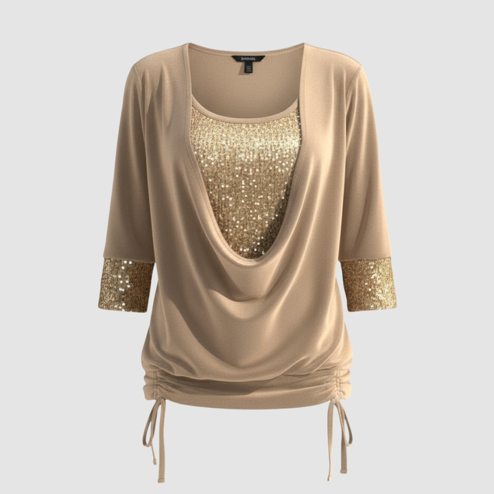 Close-up view of shimmering sequin texture on long sleeve shirt
