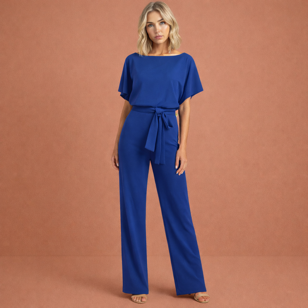 Model wearing blue elegant belted jumpsuit set