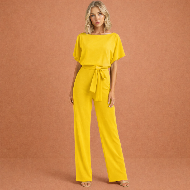 Detailed shot of fabric and tailoring on women's elegant jumpsuit