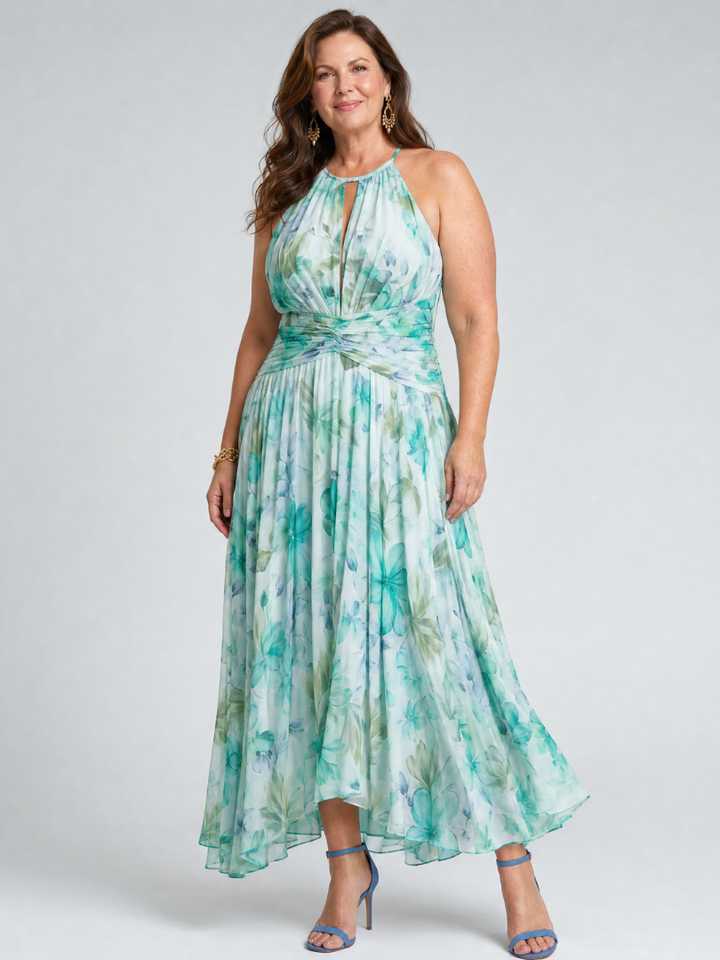 Side profile of womens halter maxi dress featuring floral print design