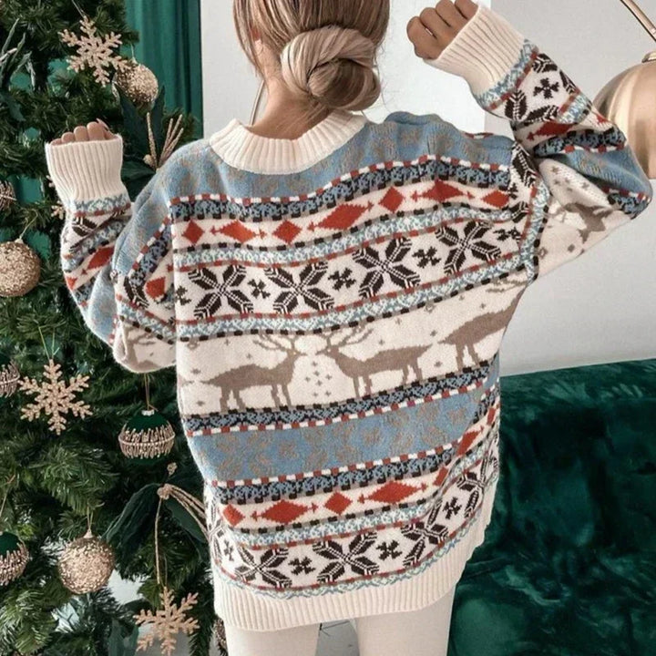Detailed shot of ribbed cuffs and hem on women's seasonal Christmas sweater holiday knitwear