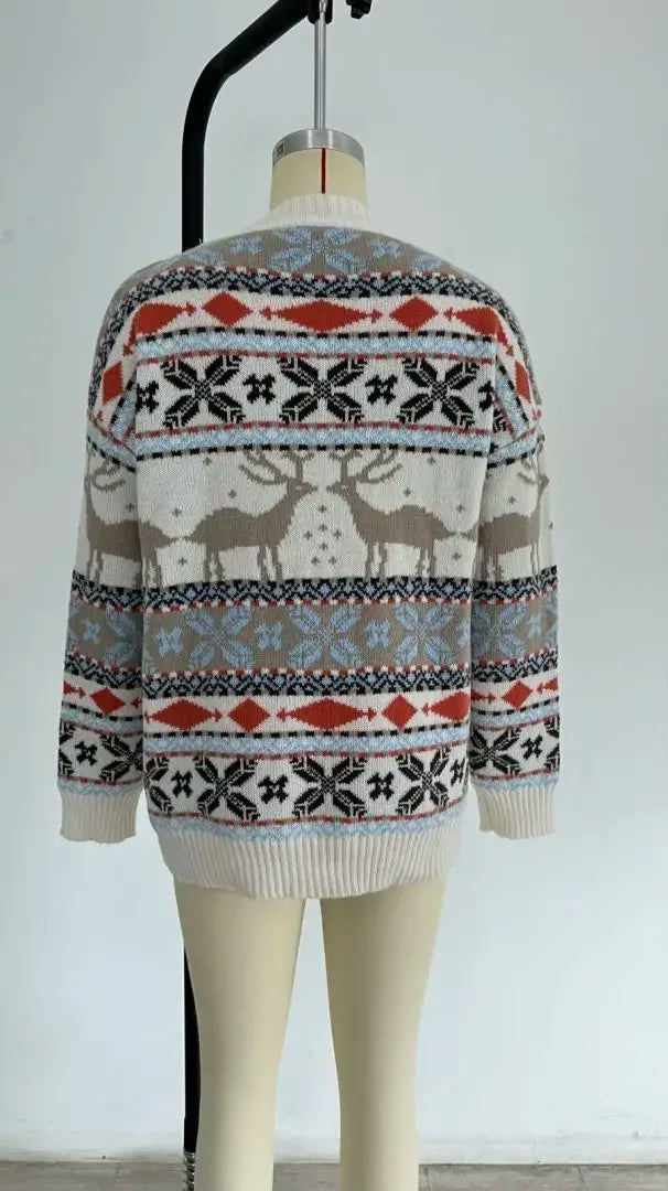Label and interior fabric detail of women's seasonal winter fashion Christmas sweater