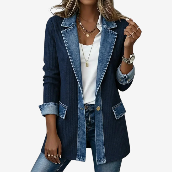 Back view of women's casual layering piece jacket combining knit and denim