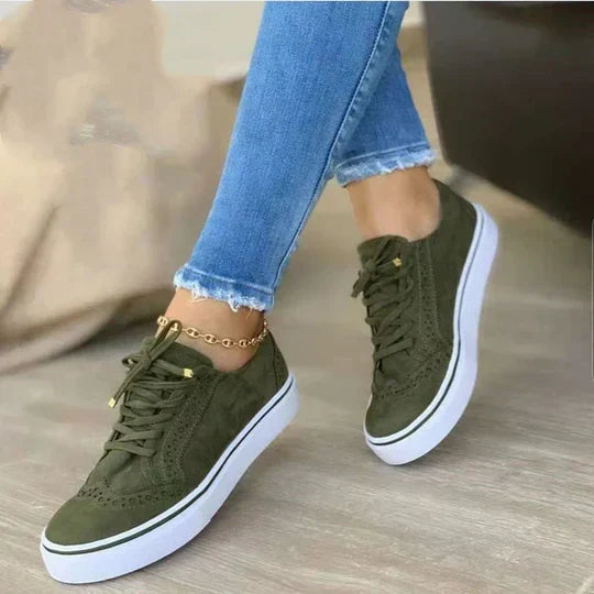 Side profile of women's comfortable lace-up walking sneakers in casual style