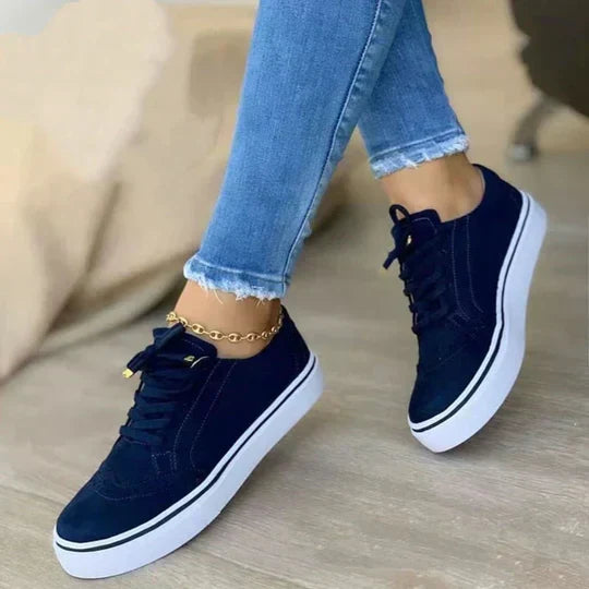 Close-up view of textured tread and sole on comfortable everyday walking shoes for women