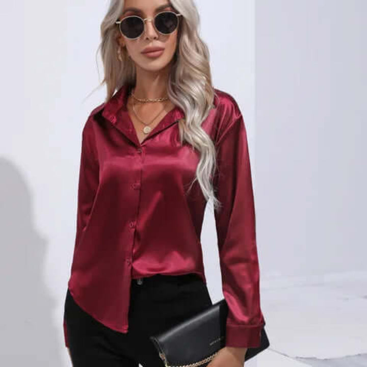 Full view of elegant women's long sleeve satin blouse and relaxed fit