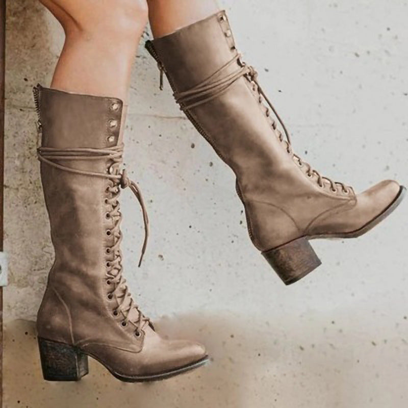 Mid-calf lace-up combat boots for women featuring supportive orthopedic design