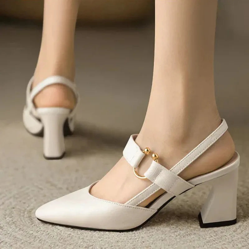 Beige orthopedic supportive high heels displayed on foot