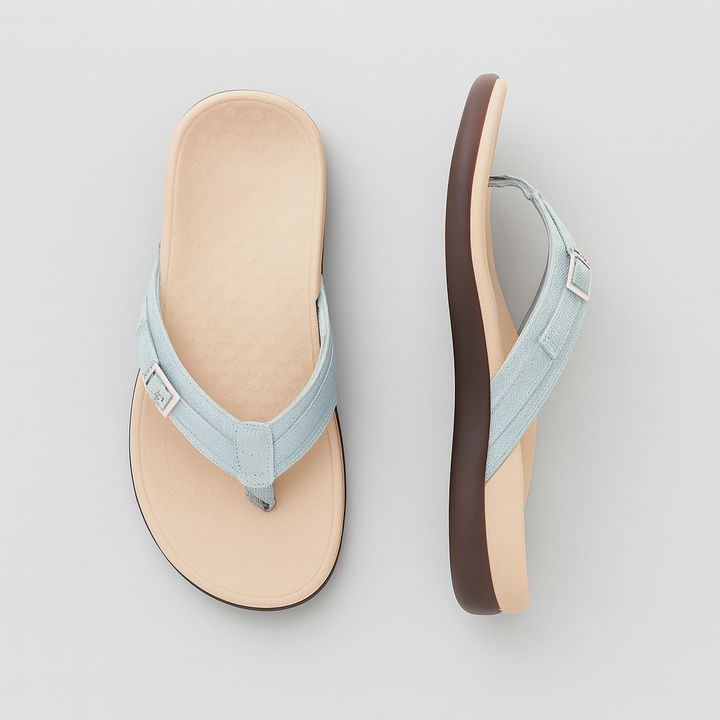 Women's orthotic thong sandals in light blue color with ergonomic footbed
