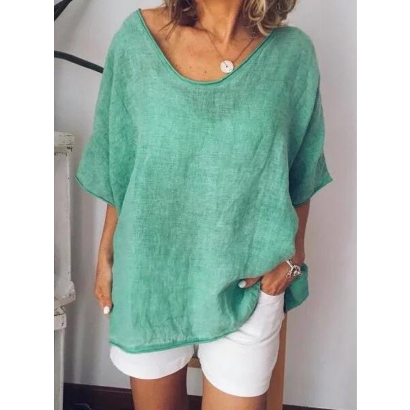Women's summer t-shirt detail shot showing premium stitching and soft cotton fabric.